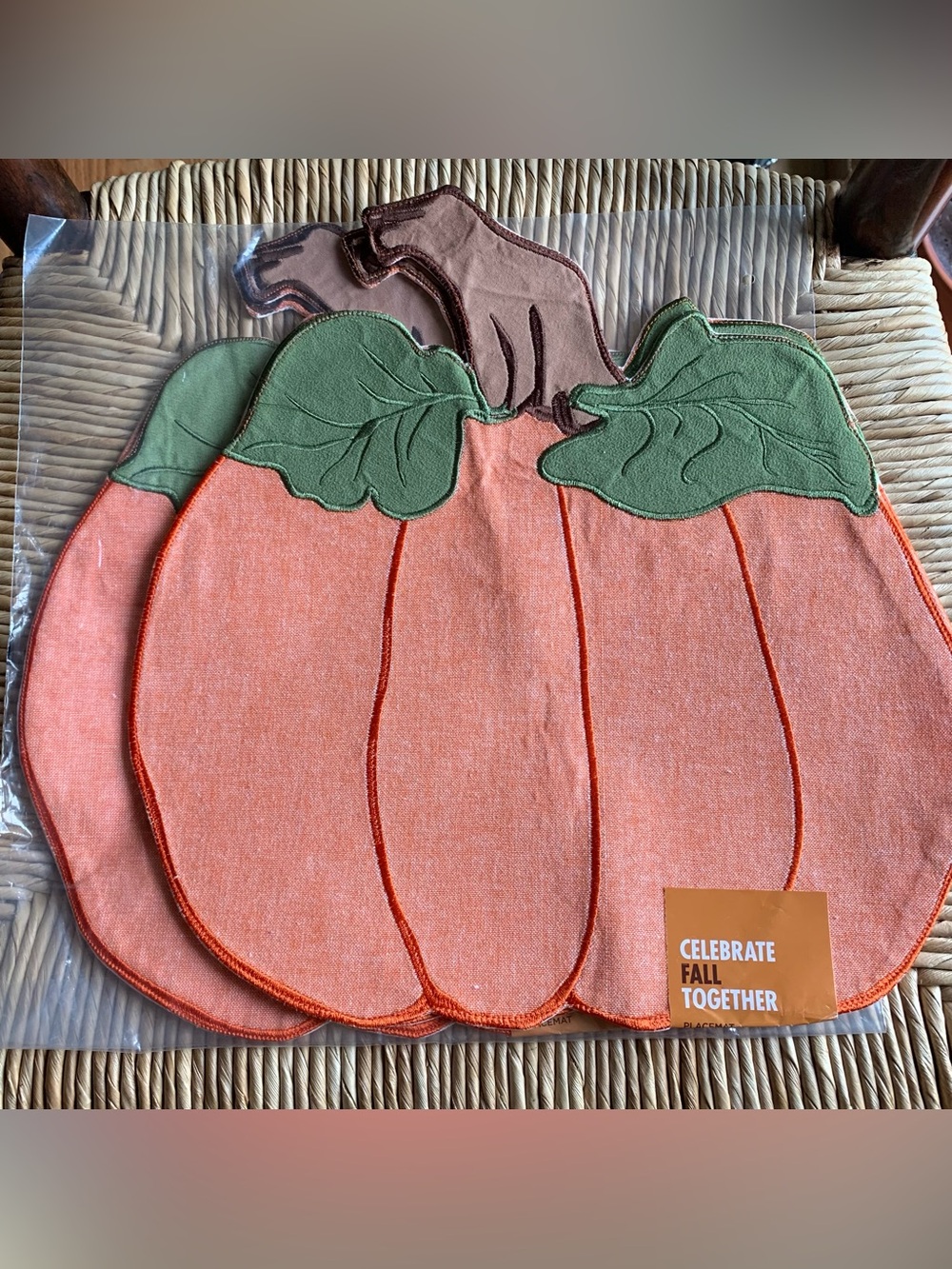 Four embroidered pumpkin placemats